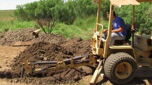 dan operating backhoe